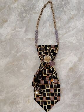 Elegant Black Geometric Silk-Style Necklace with Purple Beads
